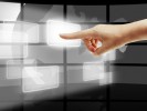 hand pushing on a touch screen interface hand pushing on a touch screen interface